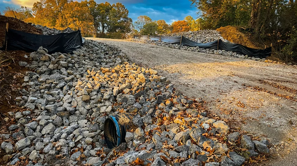 Iron Faith crew and heavy equipment on a job site